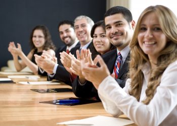 Business group clapping